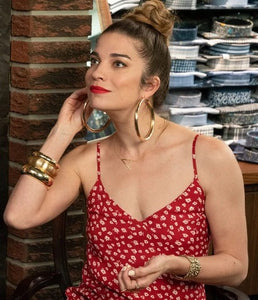 Alexis Rose from the show Schitt's Creek wearing the Sideway A Initial Necklace